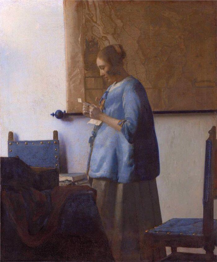 Woman in Blue Reading a Letter, 1663 by Johannes Vermeer